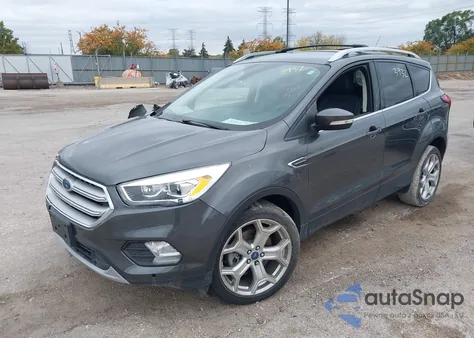 2019 Ford Escape Titanium z USA, uszkodzony, nr VIN 1FMCU0J99KUA51003